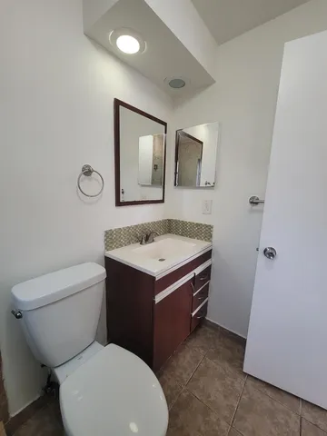 an empty room with fan