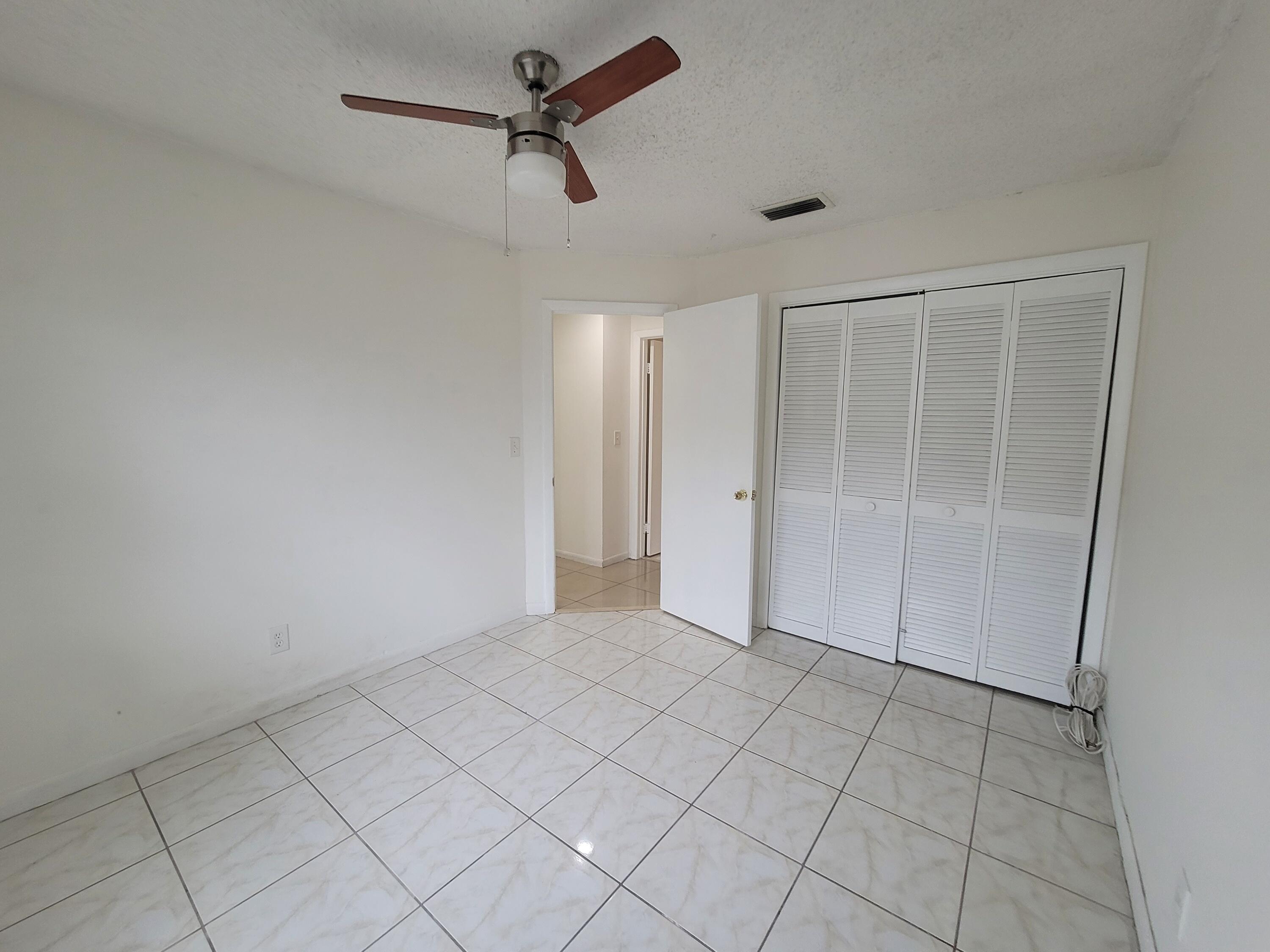 4049 Southwest 68th Way, Unit 6I Miramar, FL 33023 - Photo 28 of 32 a view of an empty room