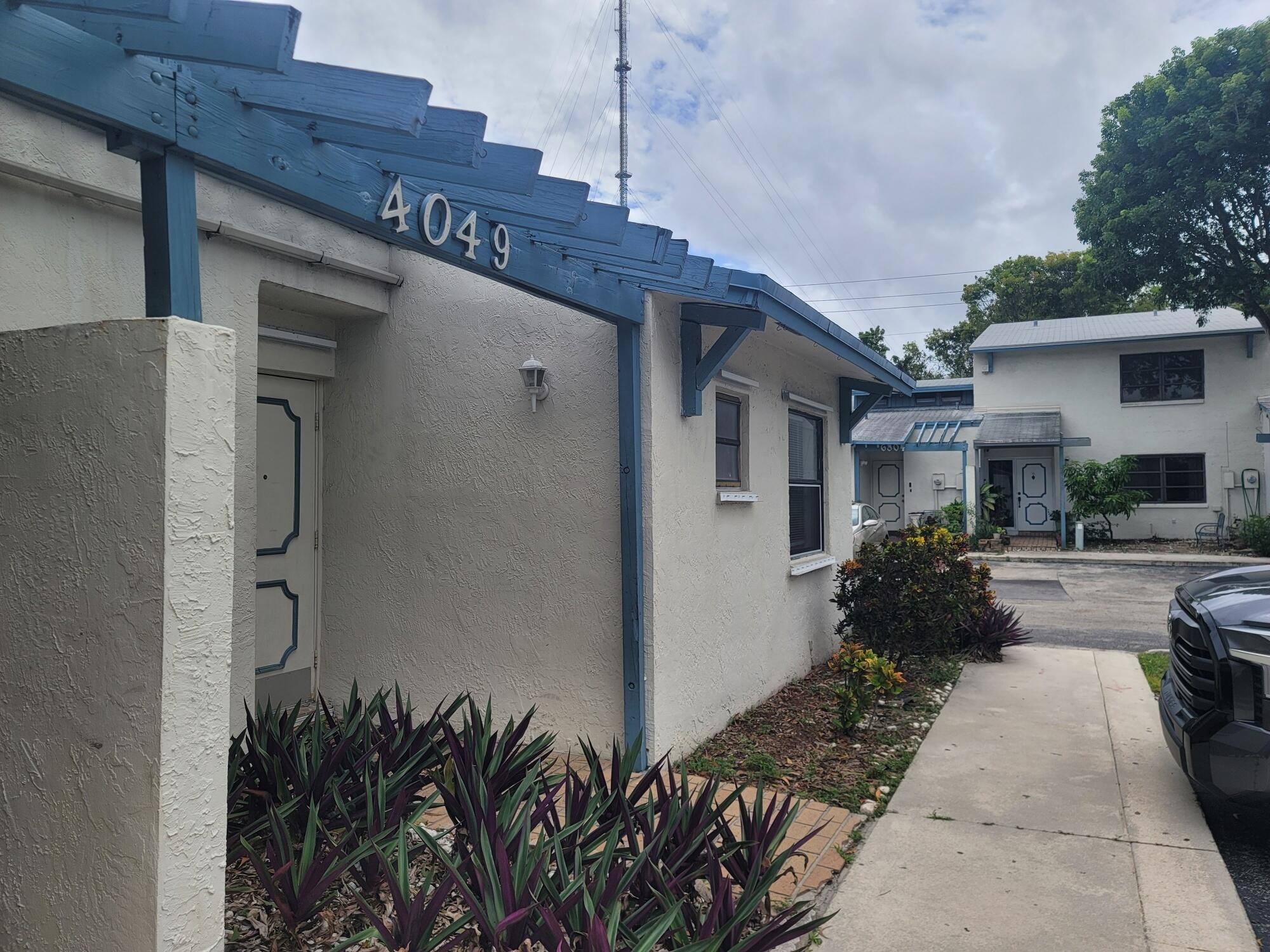 4049 Southwest 68th Way, Unit 6I Miramar, FL 33023 - Photo 4 of 32 a view of a house with a patio