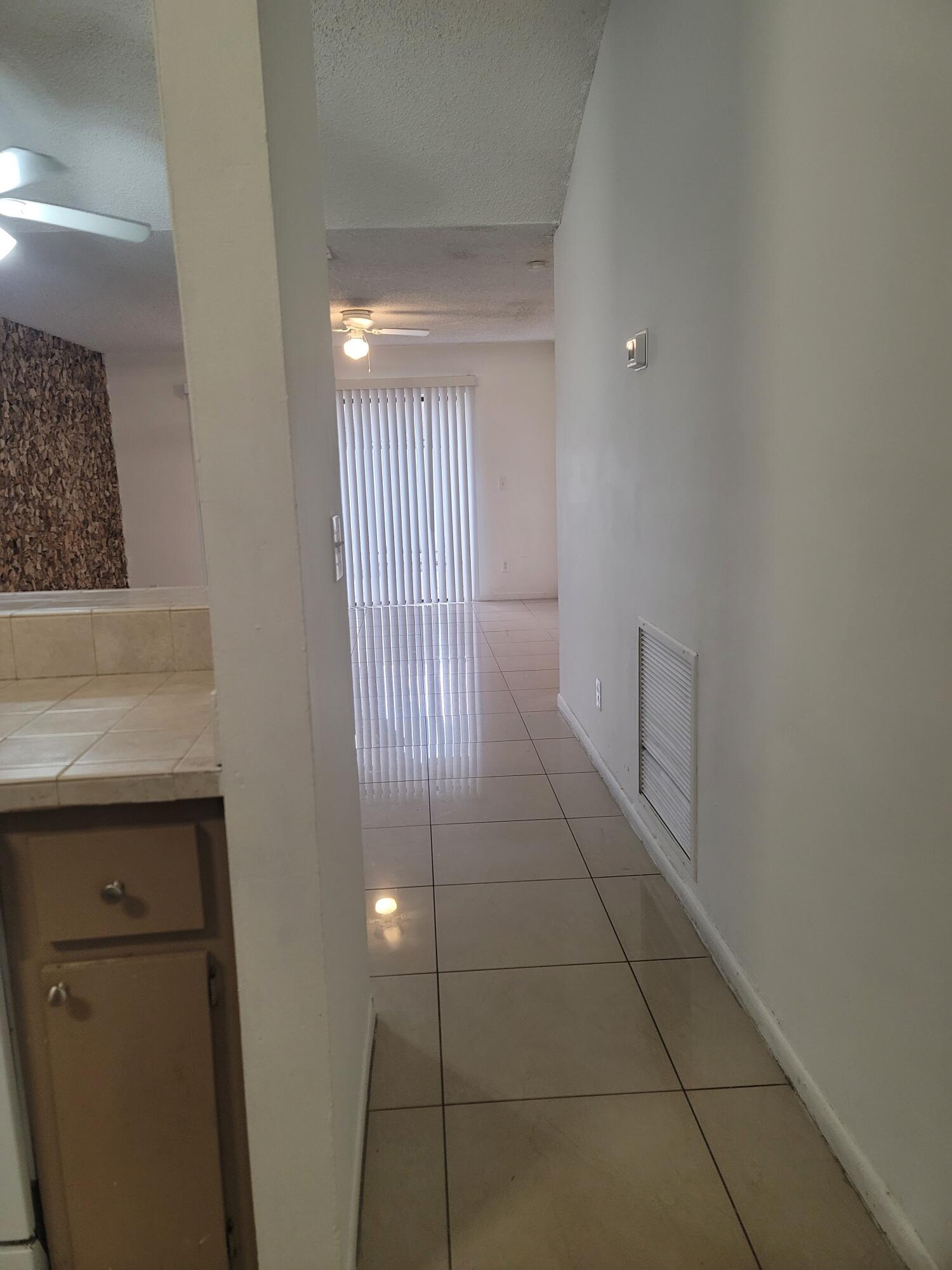 4049 Southwest 68th Way, Unit 6I Miramar, FL 33023 - Photo 8 of 32 a view of entryway with stairs