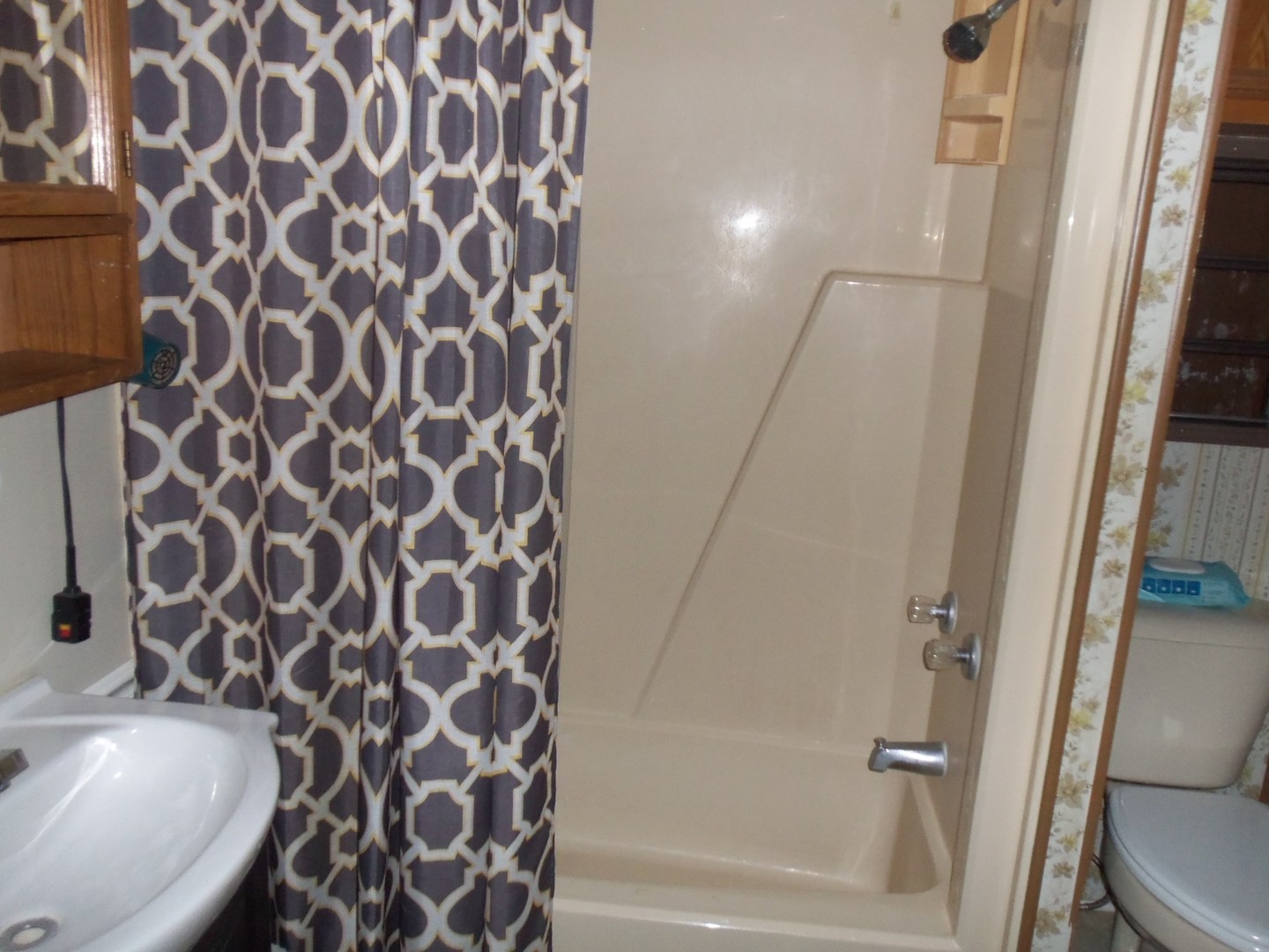 21-216 Woodhaven Sublette, IL 61367 - Photo 23 of 23 a bathroom with a bathtub and a sink