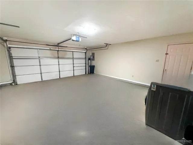 an empty room with a fireplace