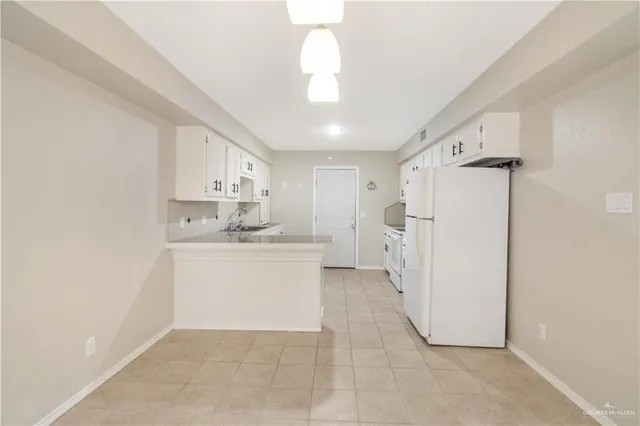 a bathroom with a sink a mirror and a shower
