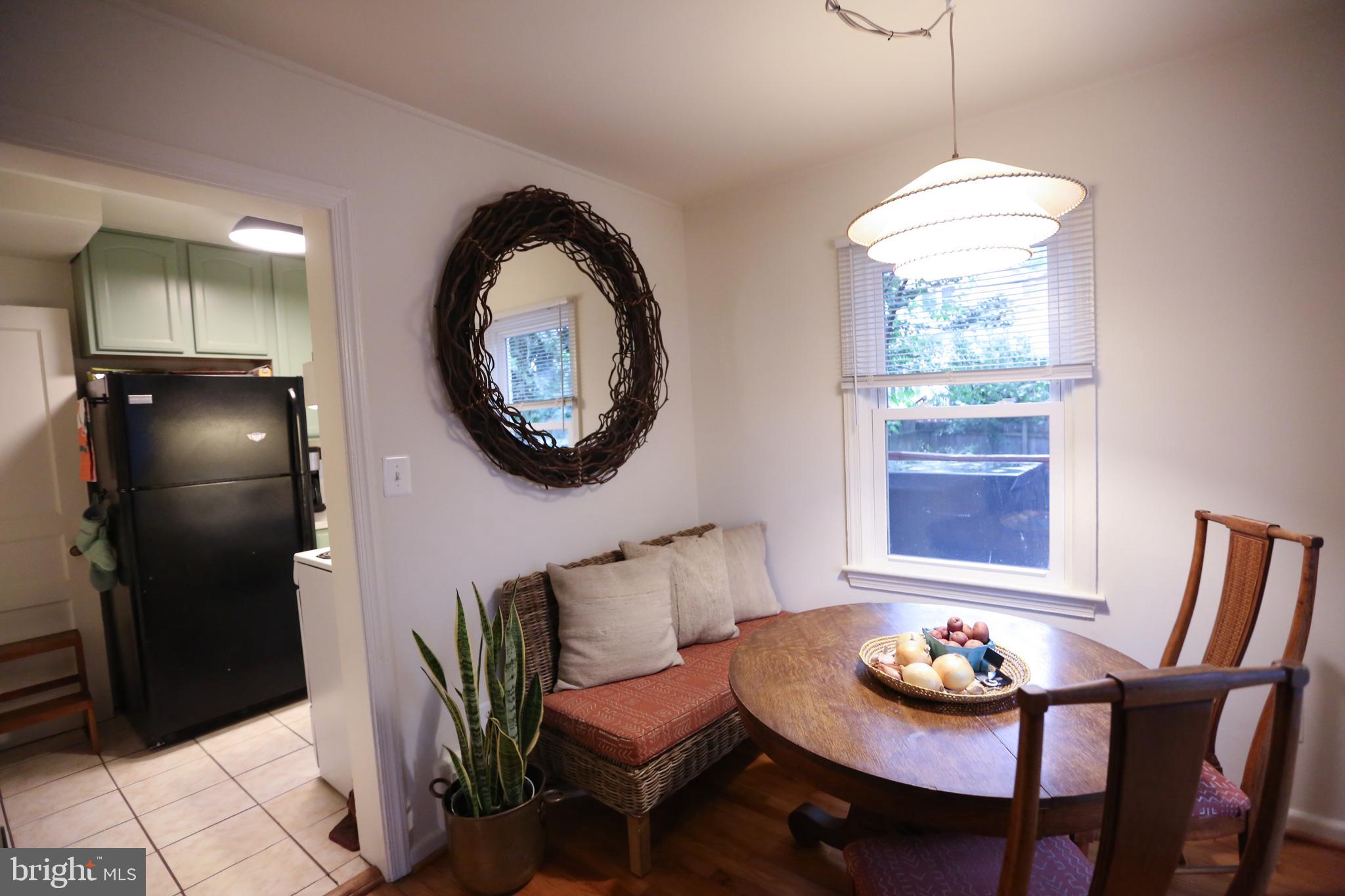 5862 Monticello Road Alexandria, VA 22303 - Photo 12 of 36 a living room with furniture and a window