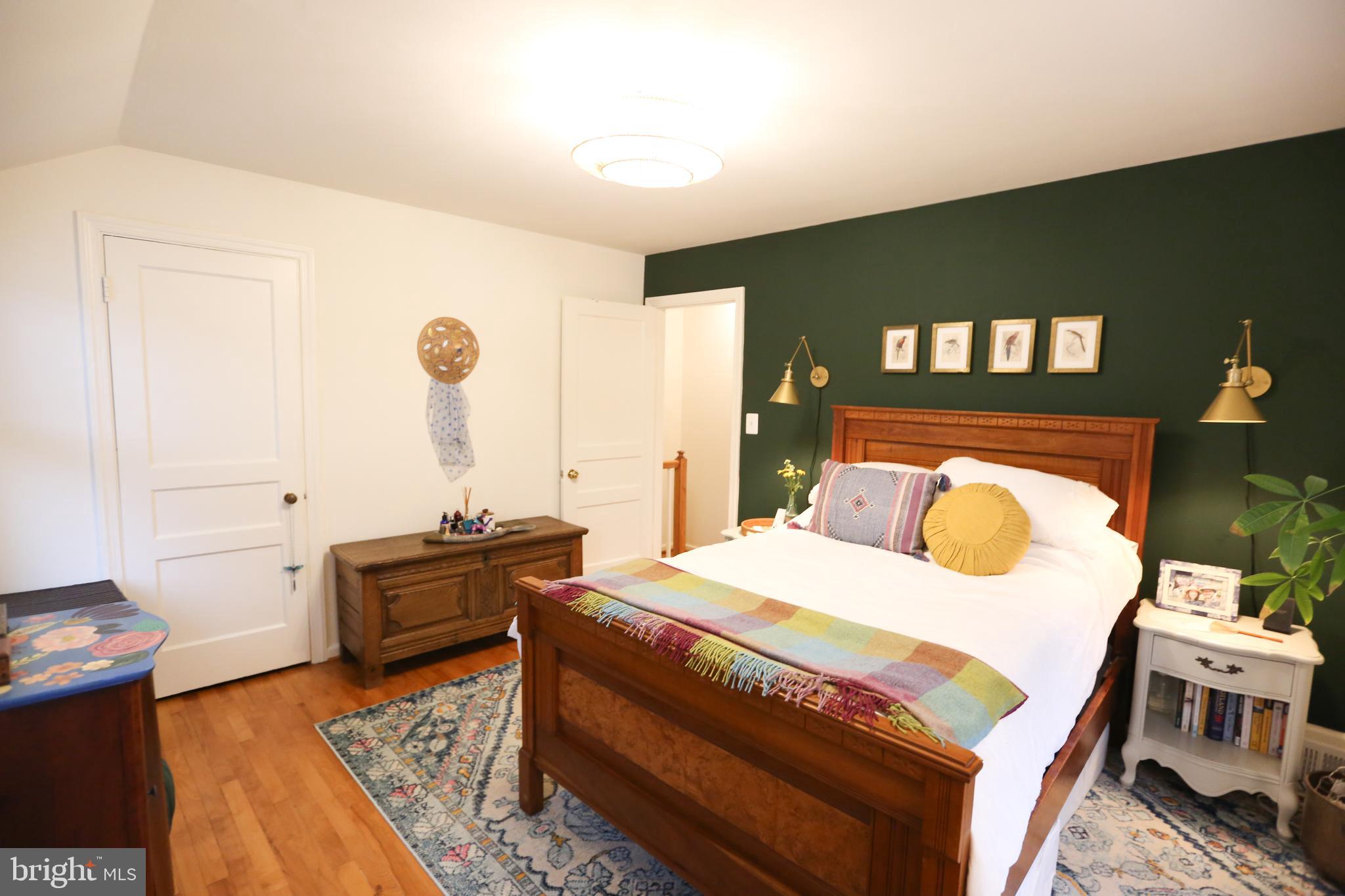 5862 Monticello Road Alexandria, VA 22303 - Photo 17 of 36 a bedroom with a bed and dresser