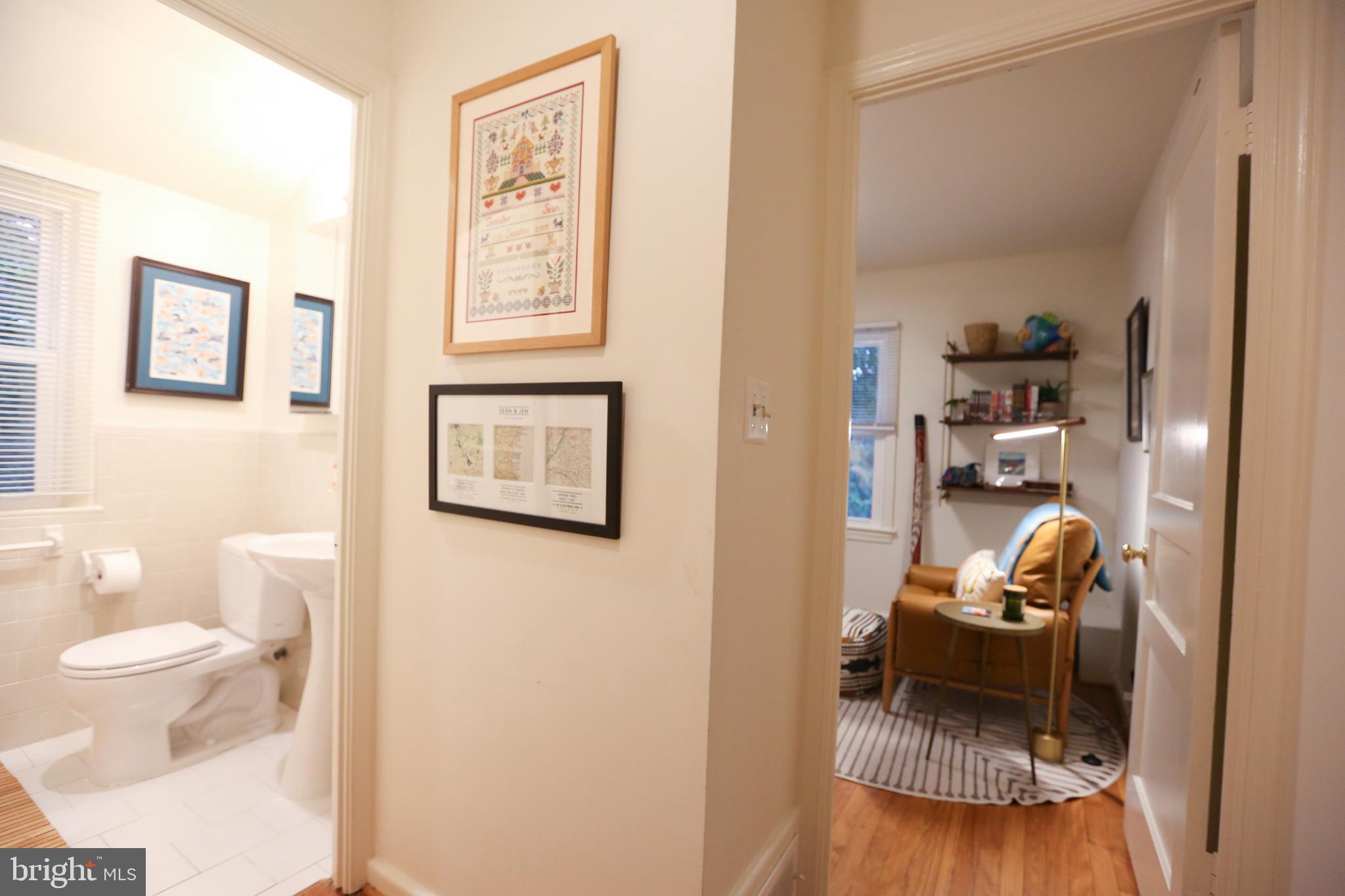 5862 Monticello Road Alexandria, VA 22303 - Photo 20 of 36 a living room with furniture and a toilet