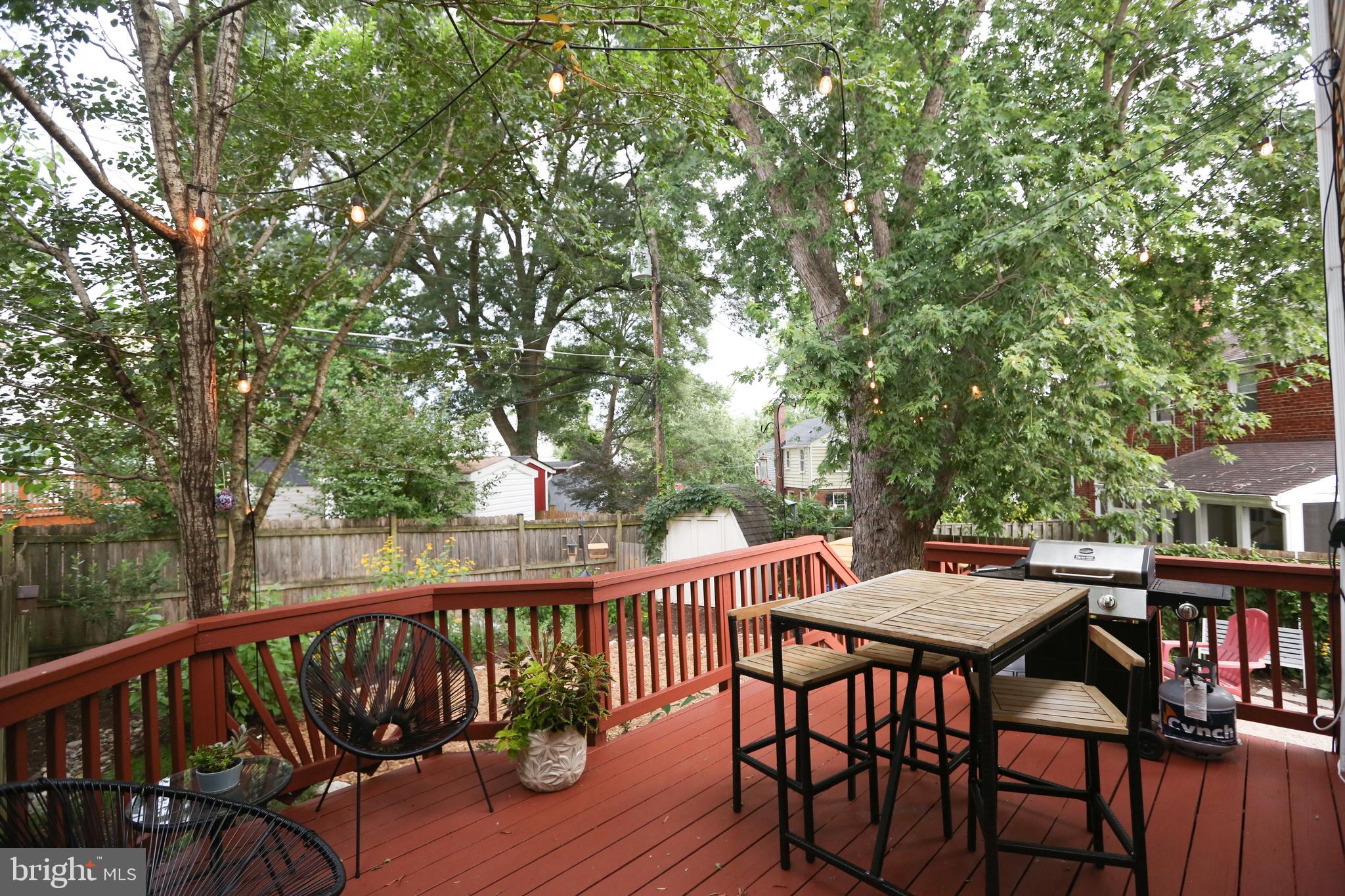 5862 Monticello Road Alexandria, VA 22303 - Photo 26 of 36 a view of a wooden chairs and table in the balcony