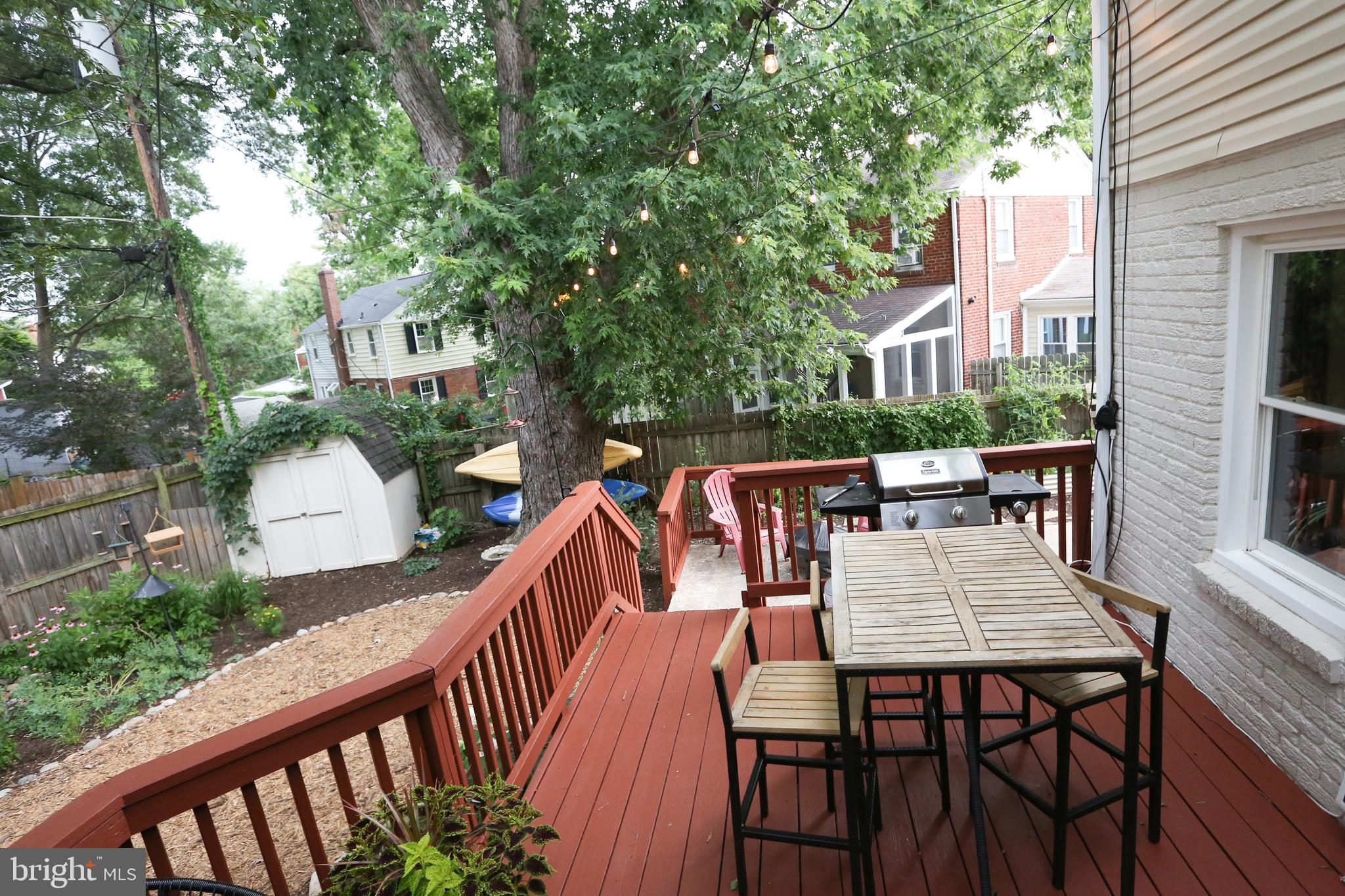 5862 Monticello Road Alexandria, VA 22303 - Photo 27 of 36 a view of a dinning table and chairs in the balcony