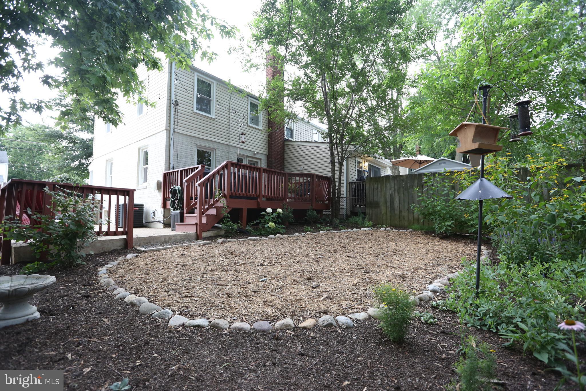 5862 Monticello Road Alexandria, VA 22303 - Photo 33 of 36 a backyard of a house with lots of green space