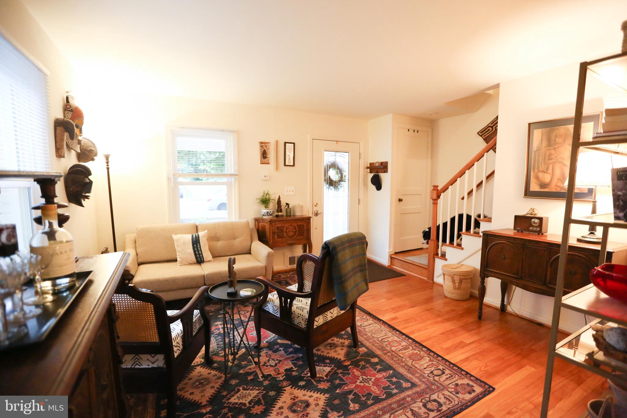 5862 Monticello Road Alexandria, VA 22303 - Photo 7 of 36 a living room with furniture and wooden floor