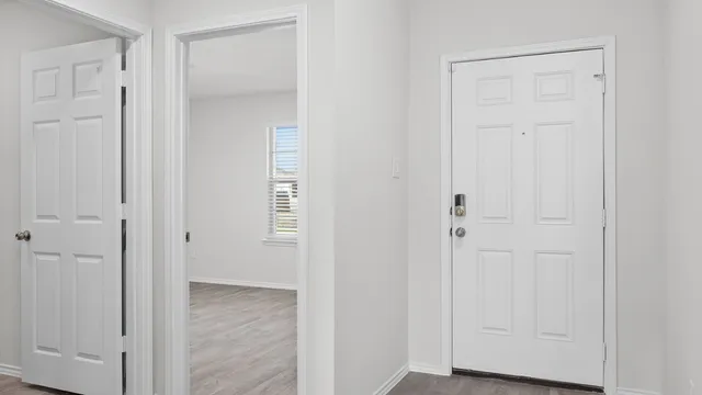 an empty room with closet door
