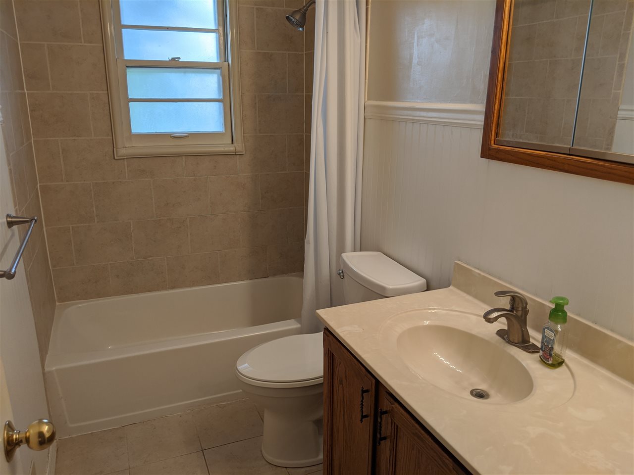 1024 Brookfield Road Rockford, IL 61107 - Photo 19 of 22 a bathroom with a sink toilet and shower