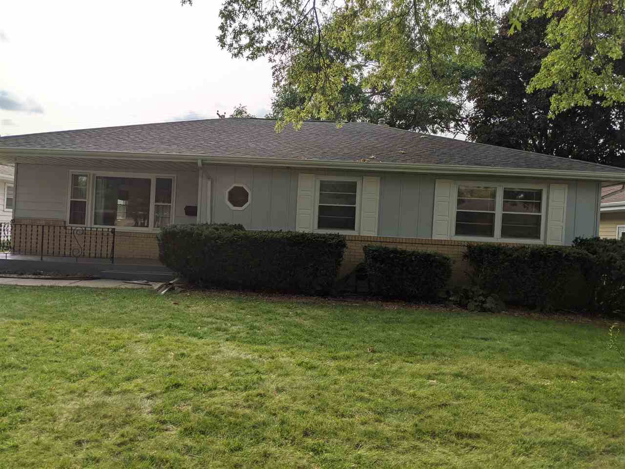 1024 Brookfield Road Rockford, IL 61107 - Photo 2 of 22 a house view with a garden space
