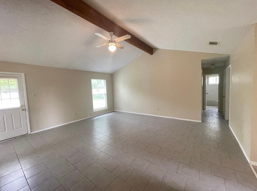 509 Riverwood Drive Cedar Park, TX 78613 - Photo 13 of 22 an empty room with windows and fan