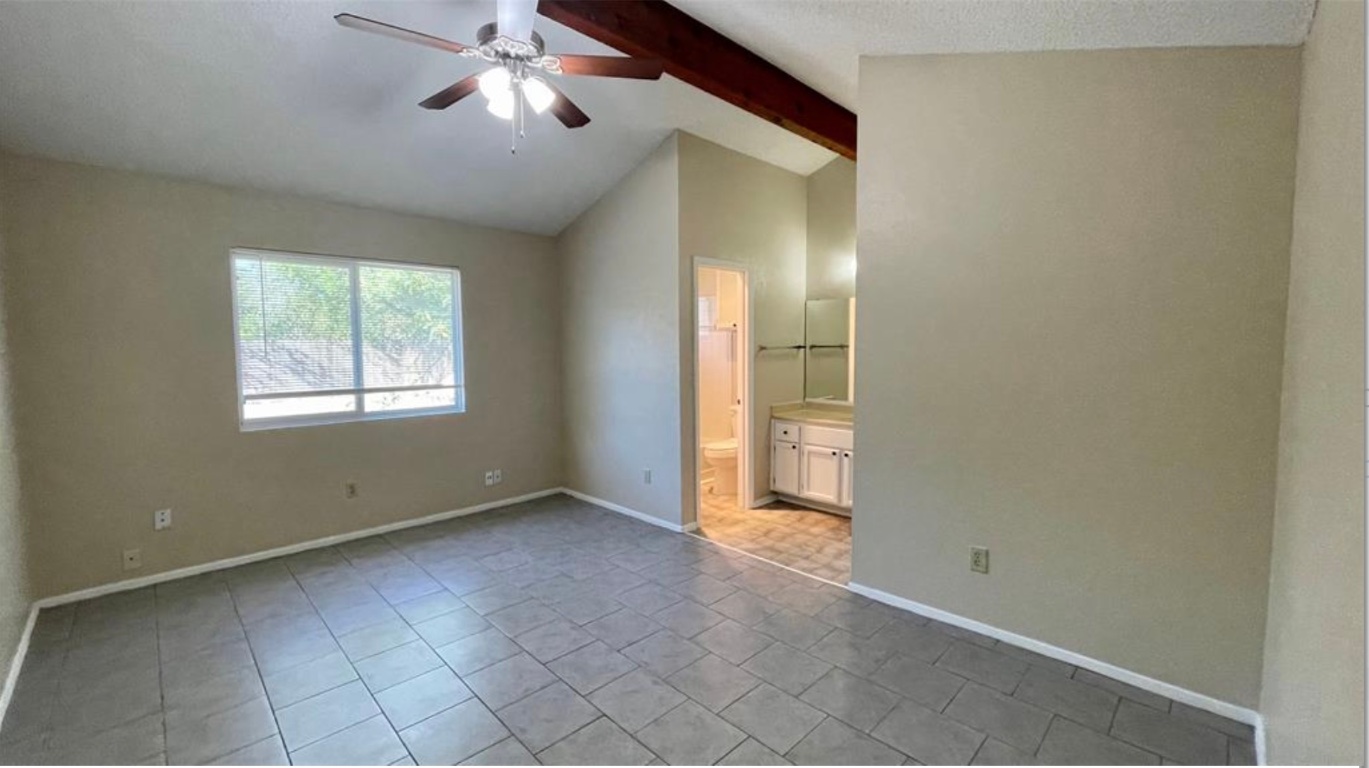 509 Riverwood Drive Cedar Park, TX 78613 - Photo 14 of 22 an empty room with windows and fan