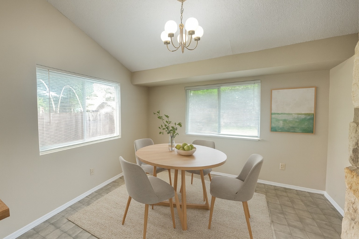 509 Riverwood Drive Cedar Park, TX 78613 - Photo 9 of 22 a view of a dining room with furniture window and outside view