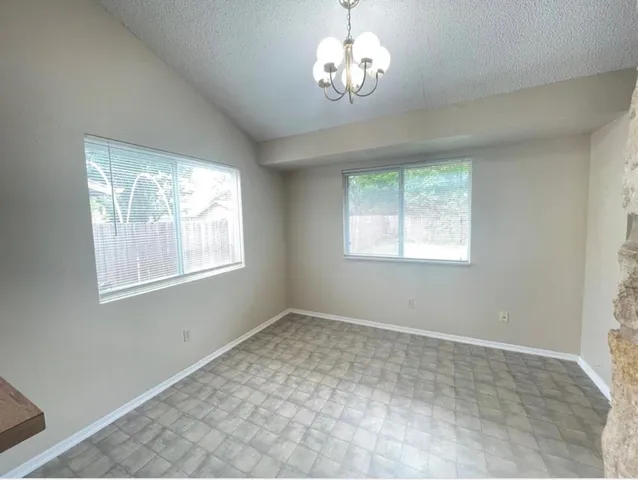 a view of a windows and a chandelier