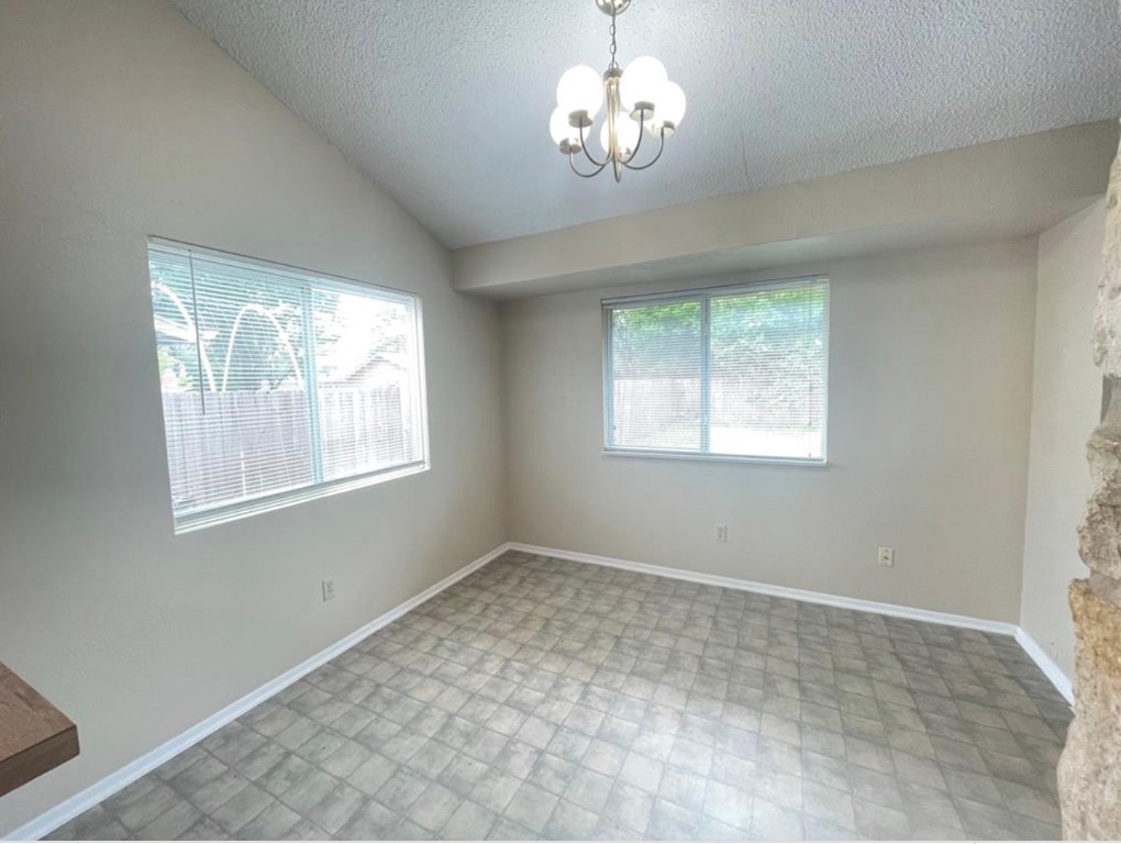 509 Riverwood Drive Cedar Park, TX 78613 - Photo 10 of 22 a view of a windows and a chandelier