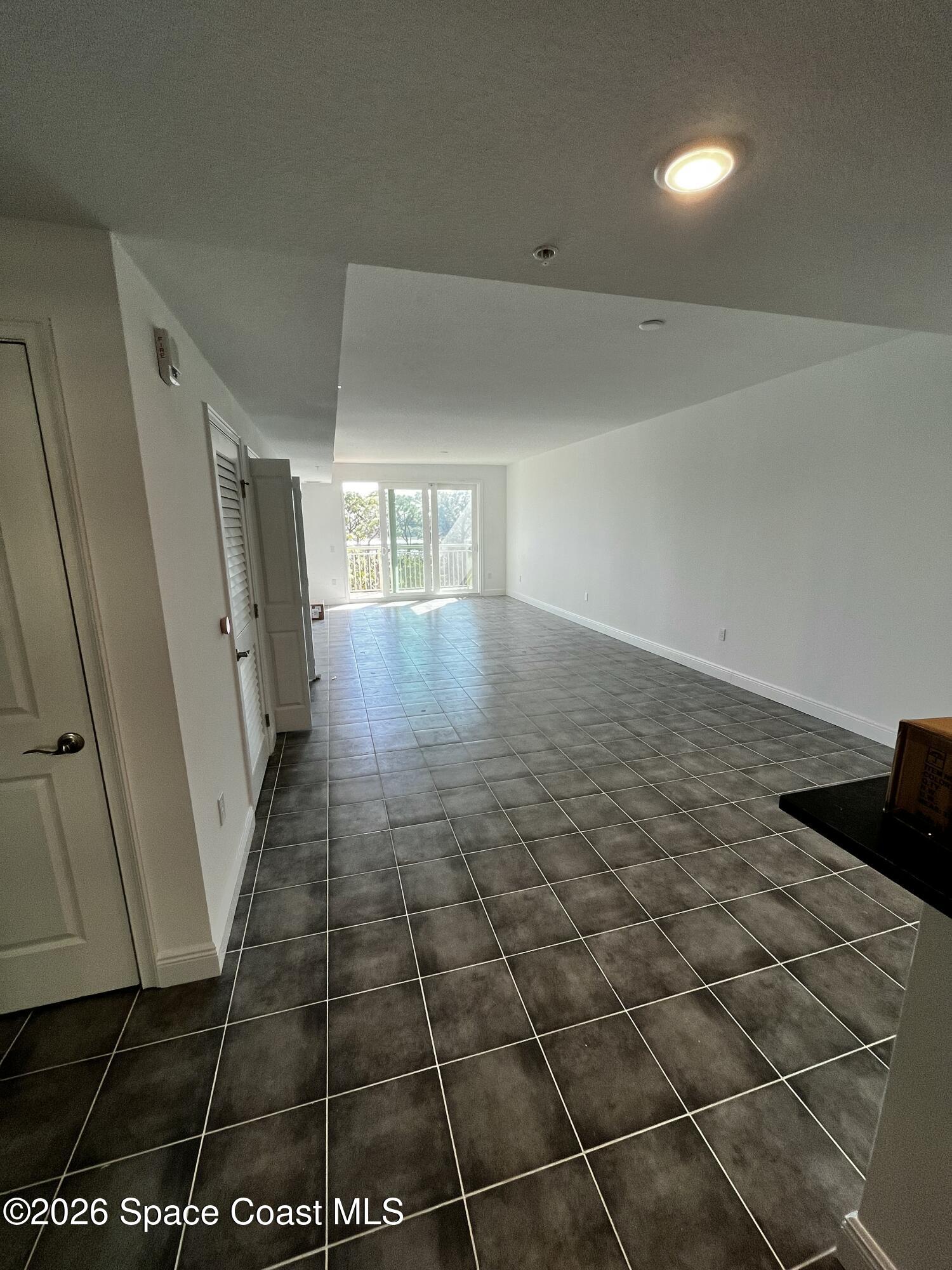 735 Pilot Lane, Unit 612 Merritt Island, FL 32952 - Photo 3 of 18 a view of a hallway