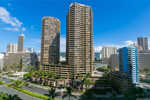 a view of a city with tall buildings