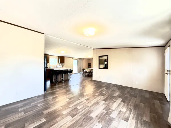 a view of livingroom with furniture and workspace