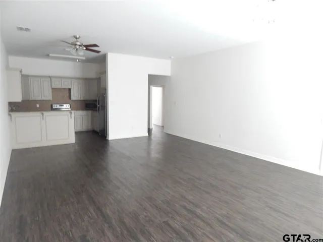 a view of a kitchen with a sink and dishwasher