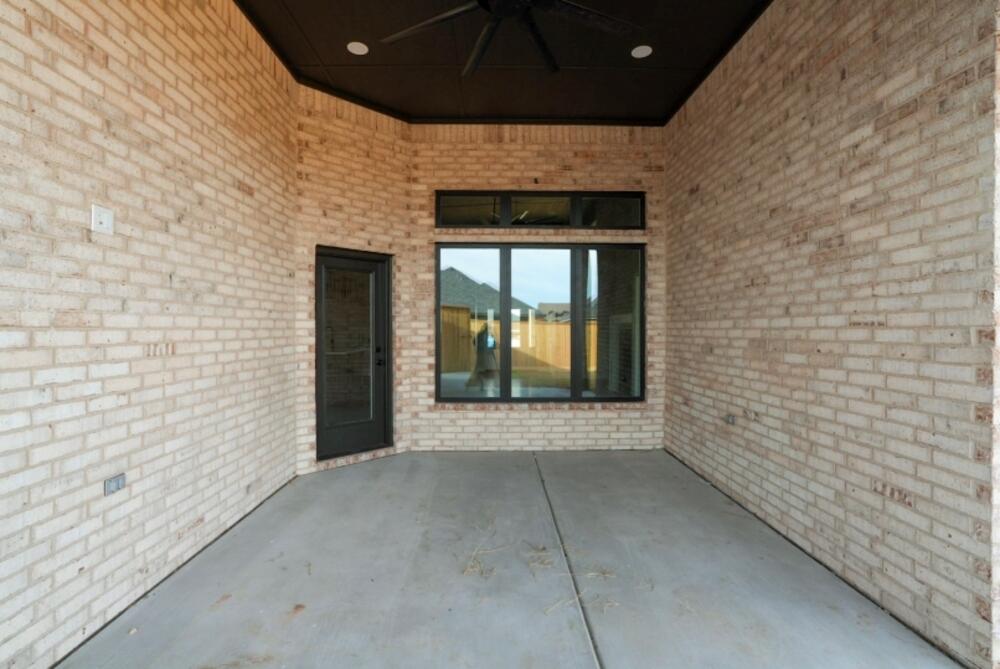7516 56th Street Lubbock, TX 79407 - Photo 29 of 31 a view of an empty room with a window