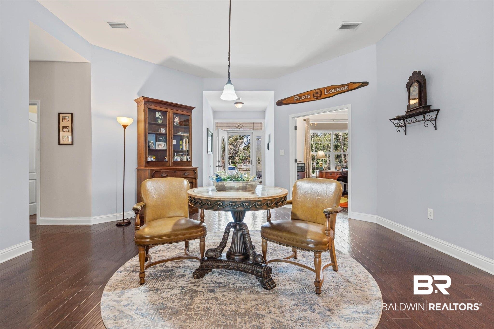 6175 South Grand Bay Wilmer Road Grand Bay, AL 36541 - Photo 19 of 42 Dining space featuring dark wood-style floors and baseboards