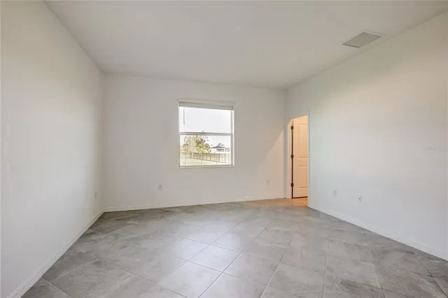 an empty room with a window