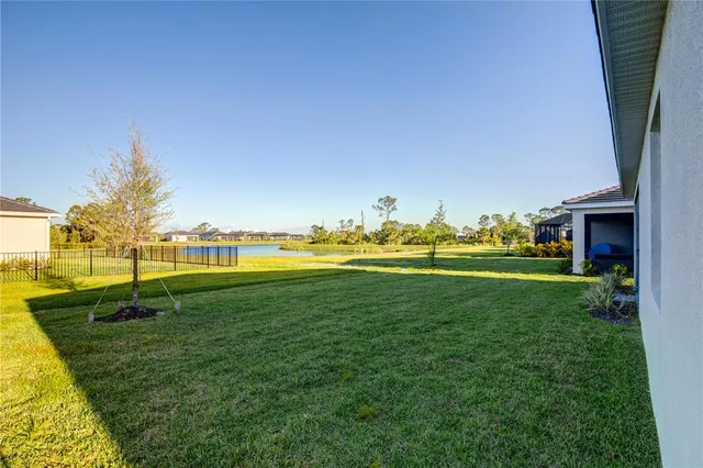 a view of a golf course with a lake