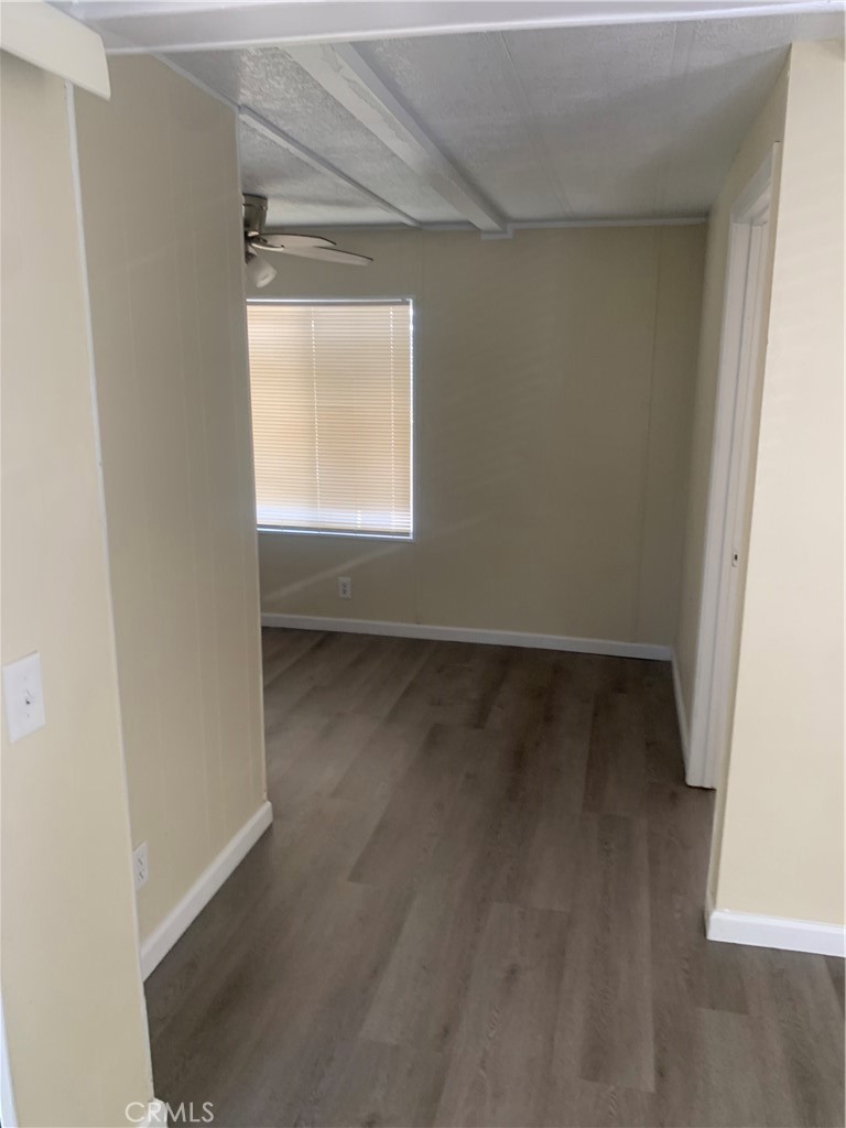 2865 West Rialto Avenue, Unit 2 Rialto, CA 92376 - Photo 18 of 19 an empty room with a window