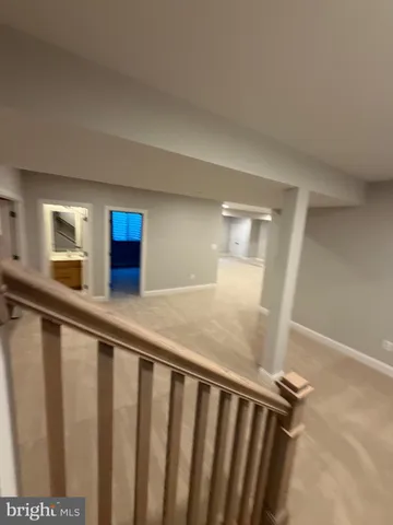 a view of hallway with mirror