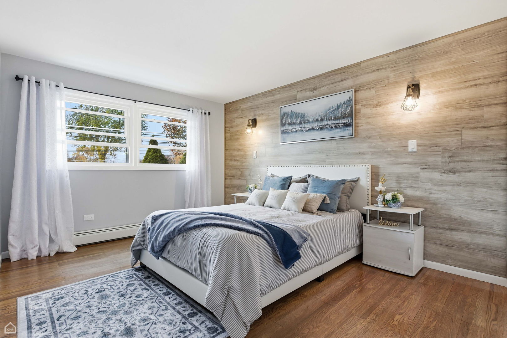 6568 West Roscoe Street, Unit 2N Chicago, IL 60634 - Photo 17 of 31 a bedroom with a bed and a window