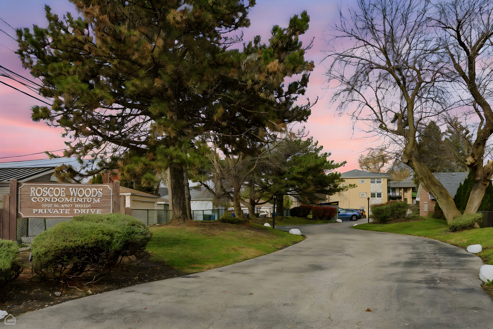 6568 West Roscoe Street, Unit 2N Chicago, IL 60634 - Photo 29 of 31 a view of road with houses