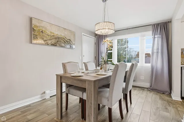 a kitchen with stainless steel appliances a refrigerator stove and sink