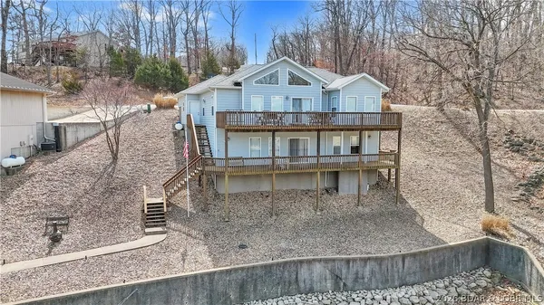 $899,900 | 465 Ledgestone Estates Lane, Sunrise Beach, MO 65079