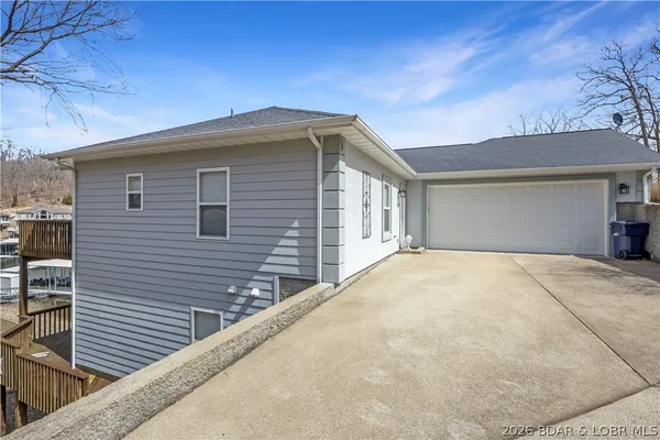 $899,900 | 465 Ledgestone Estates Lane, Sunrise Beach, MO 65079