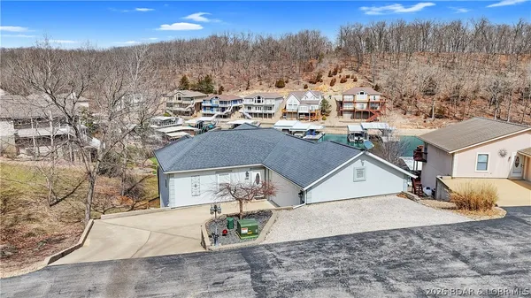 $899,900 | 465 Ledgestone Estates Lane, Sunrise Beach, MO 65079