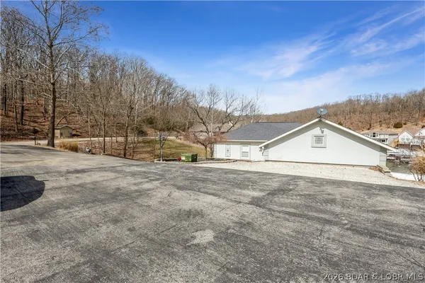 $899,900 | 465 Ledgestone Estates Lane, Sunrise Beach, MO 65079