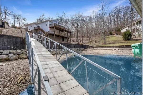 $899,900 | 465 Ledgestone Estates Lane, Sunrise Beach, MO 65079