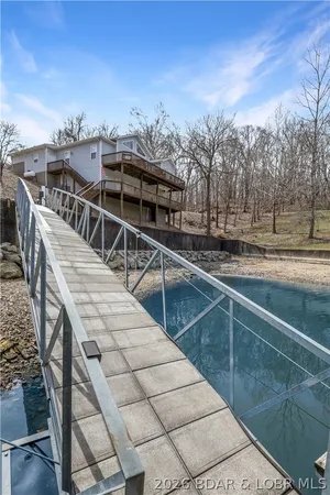 $899,900 | 465 Ledgestone Estates Lane, Sunrise Beach, MO 65079