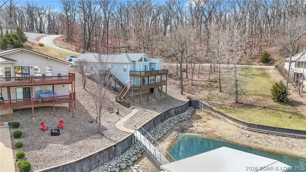 $899,900 | 465 Ledgestone Estates Lane, Sunrise Beach, MO 65079