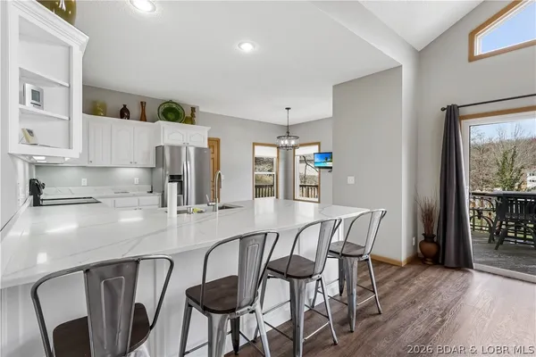 $899,900 | 465 Ledgestone Estates Lane, Sunrise Beach, MO 65079