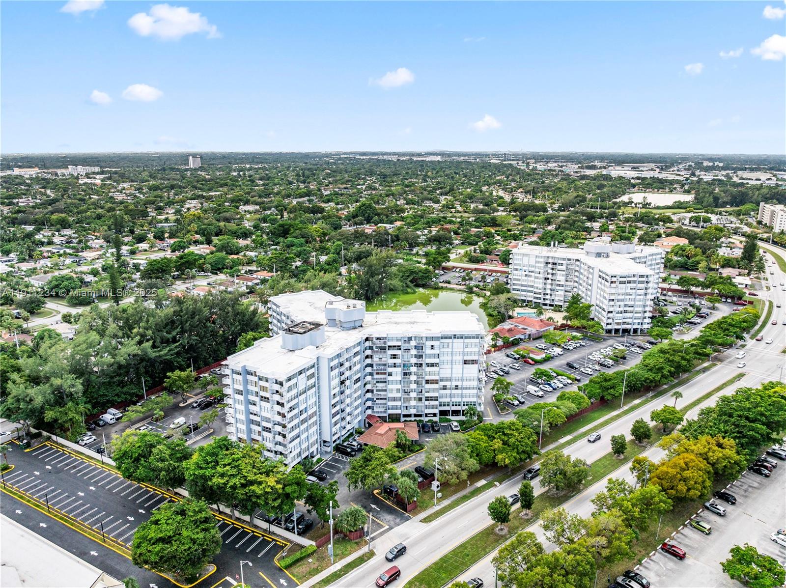 1300 Northeast Miami Gardens Drive, Unit 512E Miami, FL 33179 - Photo 4 of 22 an aerial view of a city