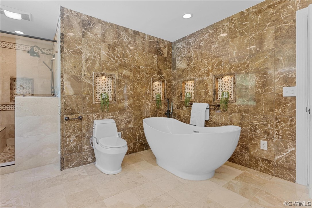 19960 Horseshoe Road Carson, VA 23830 - Photo 32 of 47 a bathroom with a bathtub and shower