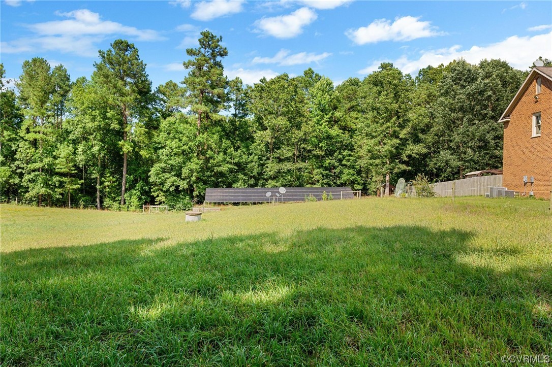 19960 Horseshoe Road Carson, VA 23830 - Photo 44 of 47 a view of yard with swimming pool and green space