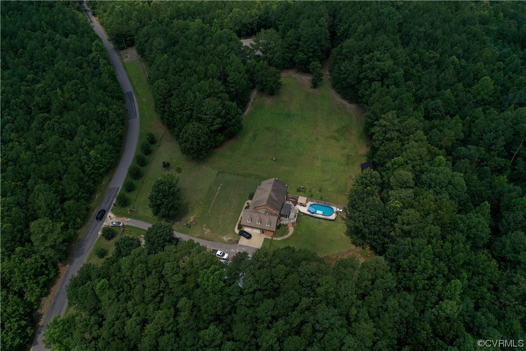19960 Horseshoe Road Carson, VA 23830 - Photo 47 of 47 an aerial view of a house with outdoor space swimming pool and lots of green space