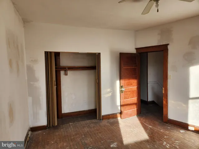 a view of an empty room and window