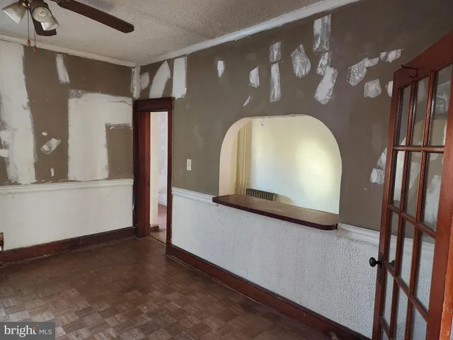 a view of a livingroom with wooden floor