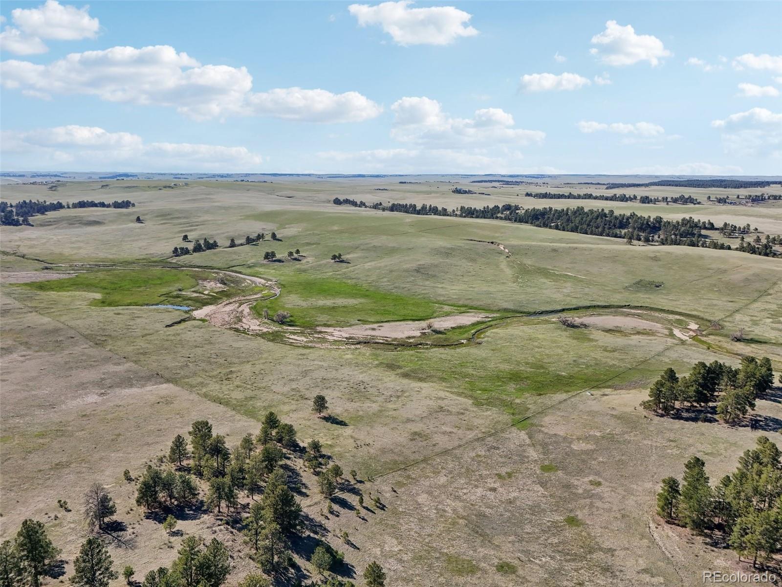 102 County Road Elbert, CO 80106 - Photo 27 of 37 a view of a lake with beach and ocean view